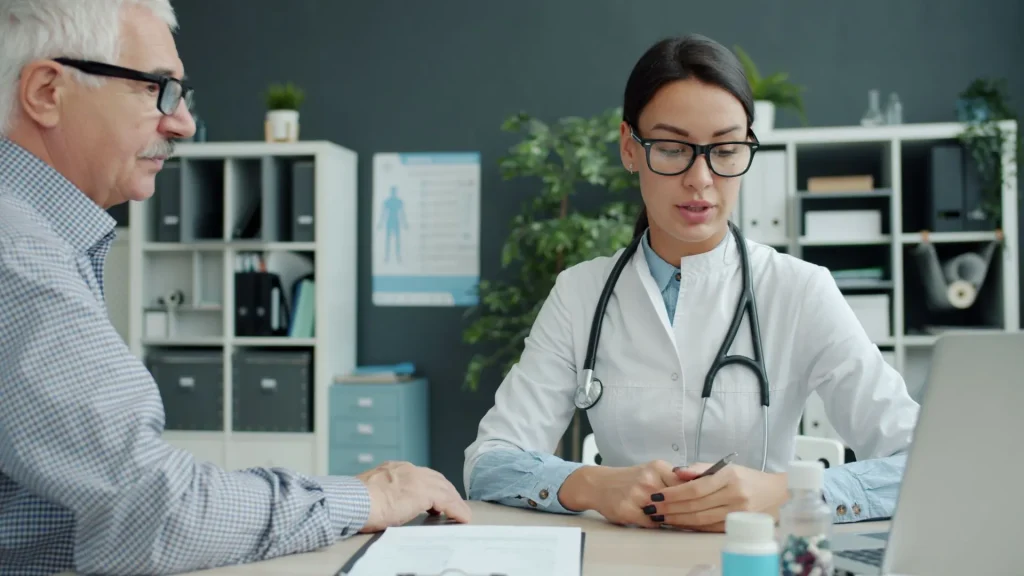 Doctor talking with an older patient