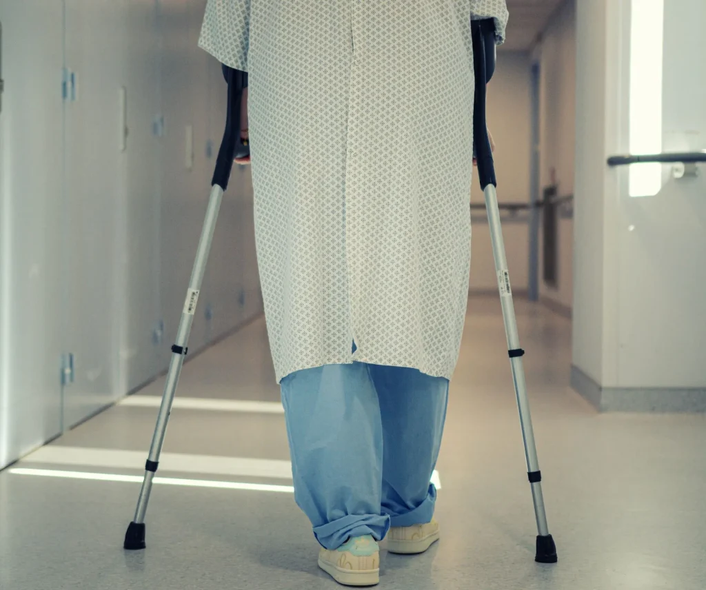 Patient walking in a hospital corridor